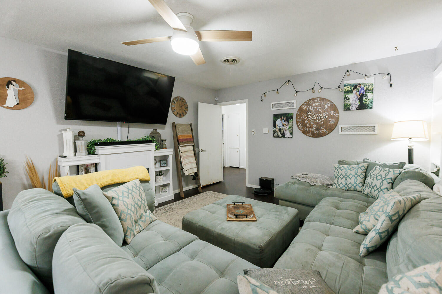 2718 55th Street Lubbock, TX 79413 - Photo 5 of 58 a living room with furniture and a flat screen tv