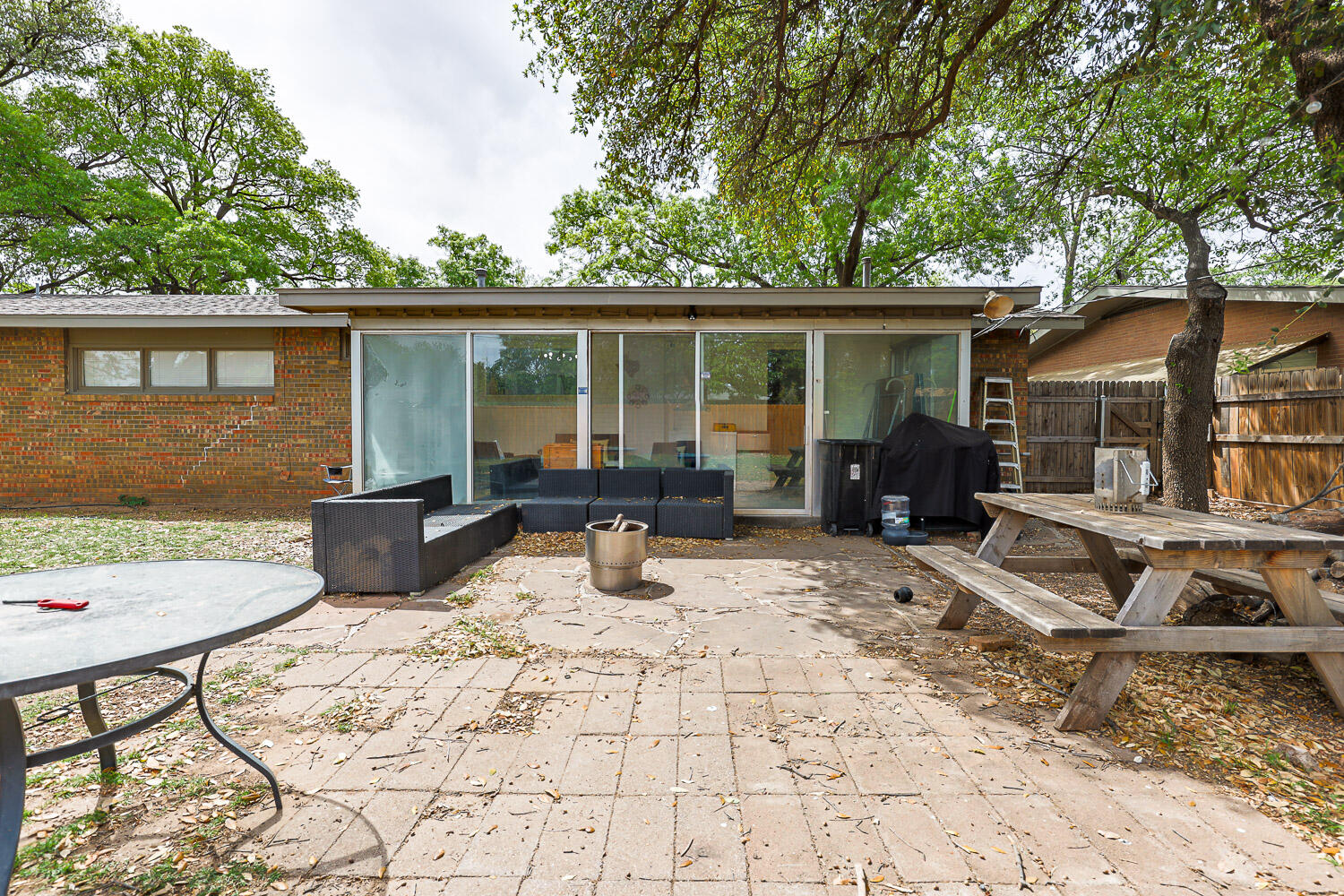2718 55th Street Lubbock, TX 79413 - Photo 52 of 58 a view of a backyard with a sitting area