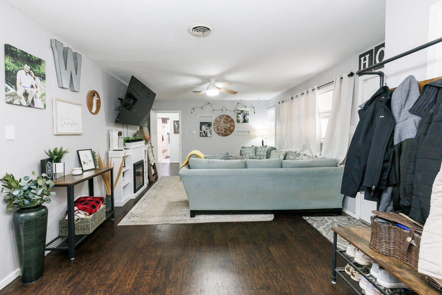 2718 55th Street Lubbock, TX 79413 - Photo 7 of 58 a view of living room with furniture and flat screen tv