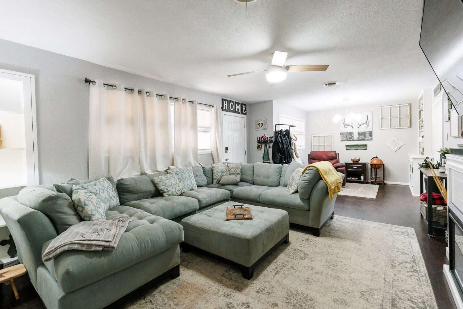 2718 55th Street Lubbock, TX 79413 - Photo 10 of 58 a living room with furniture and a large window
