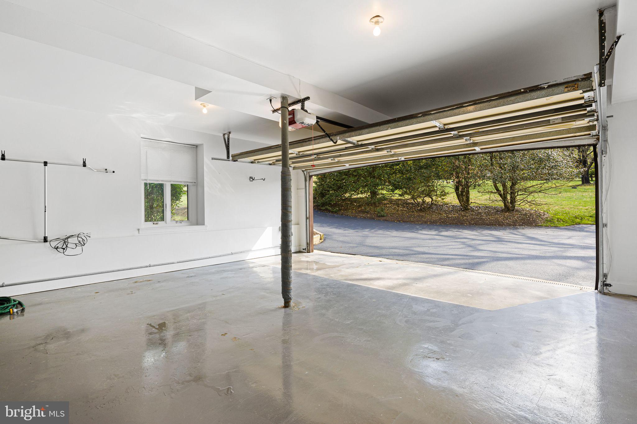 883 Echo Hill Road West Chester, PA 19382 - Photo 39 of 50 Spacious garage with natural light.