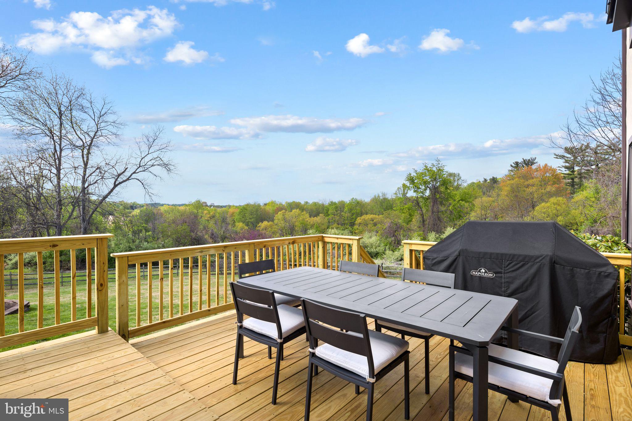 883 Echo Hill Road West Chester, PA 19382 - Photo 41 of 50 Scenic deck with lush green views.