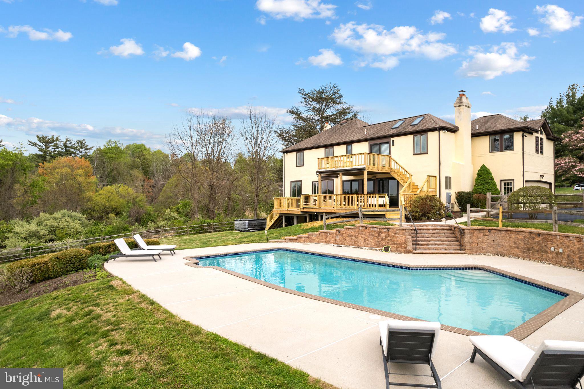 883 Echo Hill Road West Chester, PA 19382 - Photo 47 of 50 Serene retreat with poolside views.