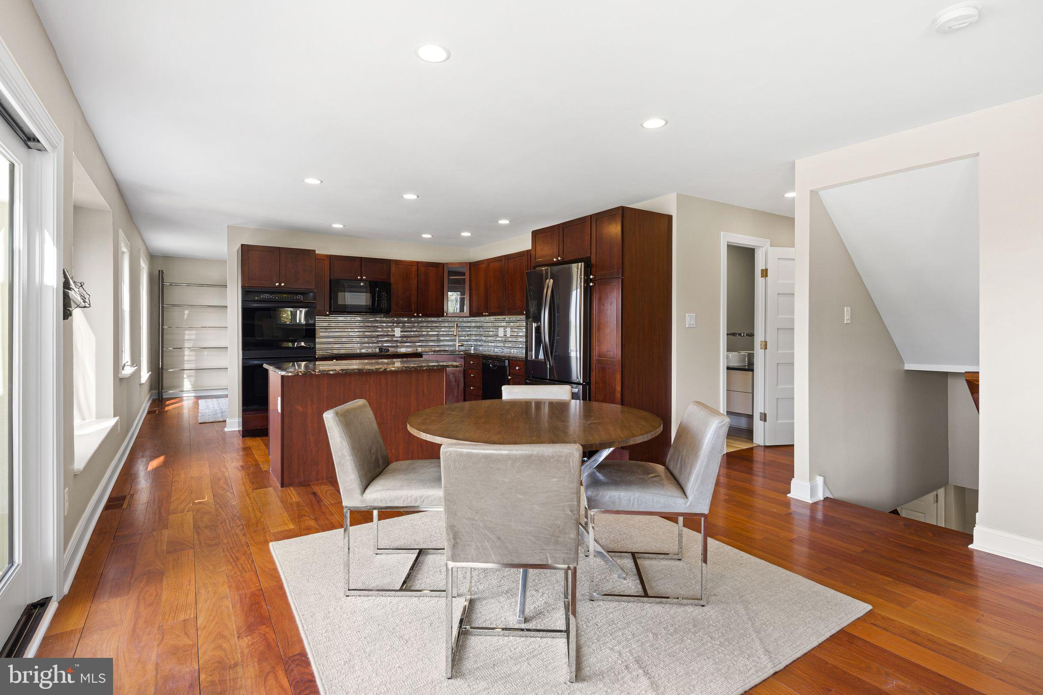 883 Echo Hill Road West Chester, PA 19382 - Photo 9 of 50 Modern kitchen with warm wood tones.
