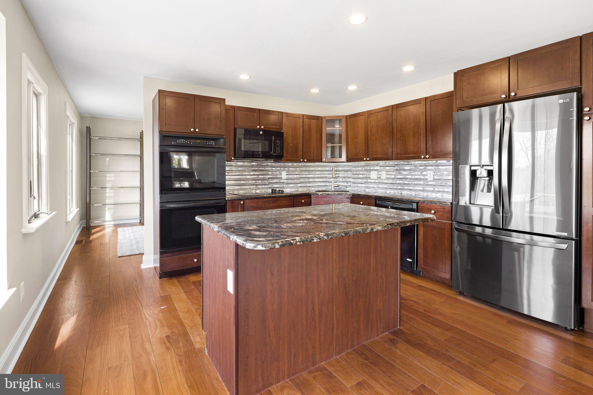 883 Echo Hill Road West Chester, PA 19382 - Photo 10 of 50 Modern kitchen with sleek finishes.