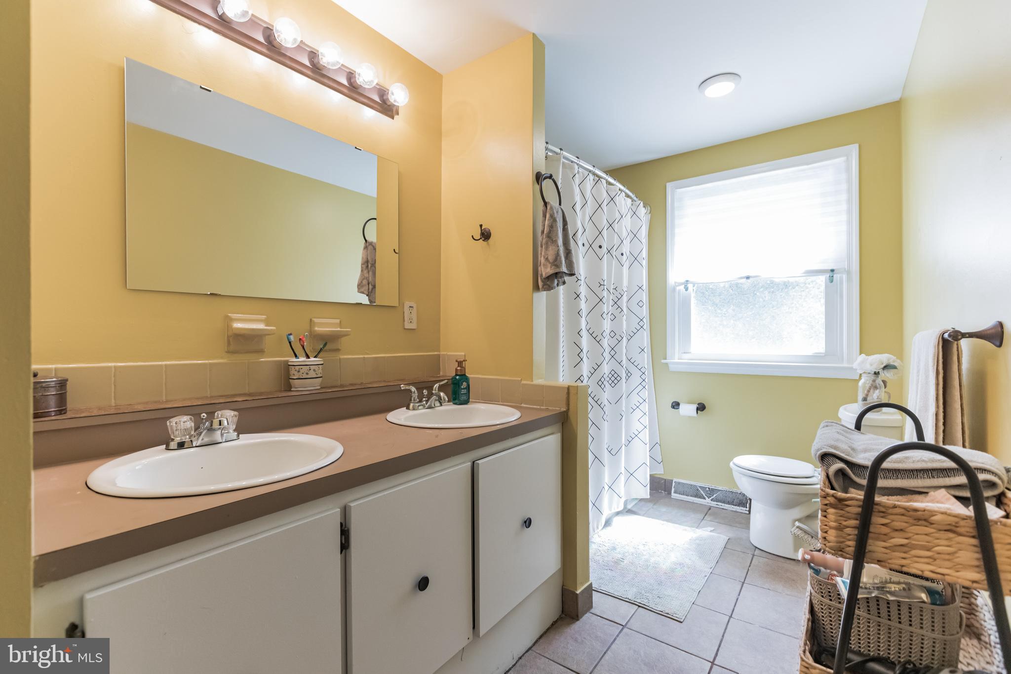 134 Sandringham Road Cherry Hill, NJ 08003 - Photo 21 of 30 Hall Bathroom with Tub, Shower and Double Sink