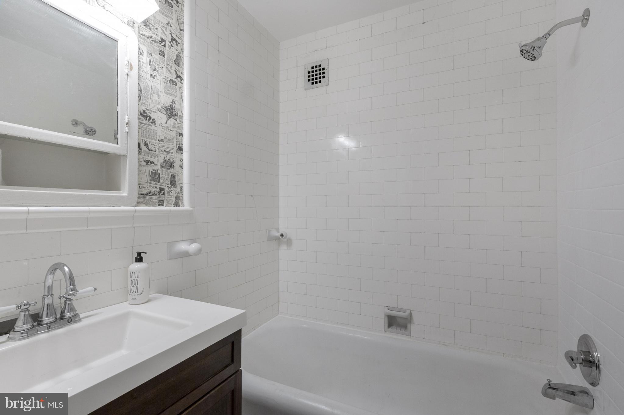 1324 Locust Street, Unit 1402 Philadelphia, PA 19107 - Photo 7 of 20 Updated Full 3-piece Bathroom