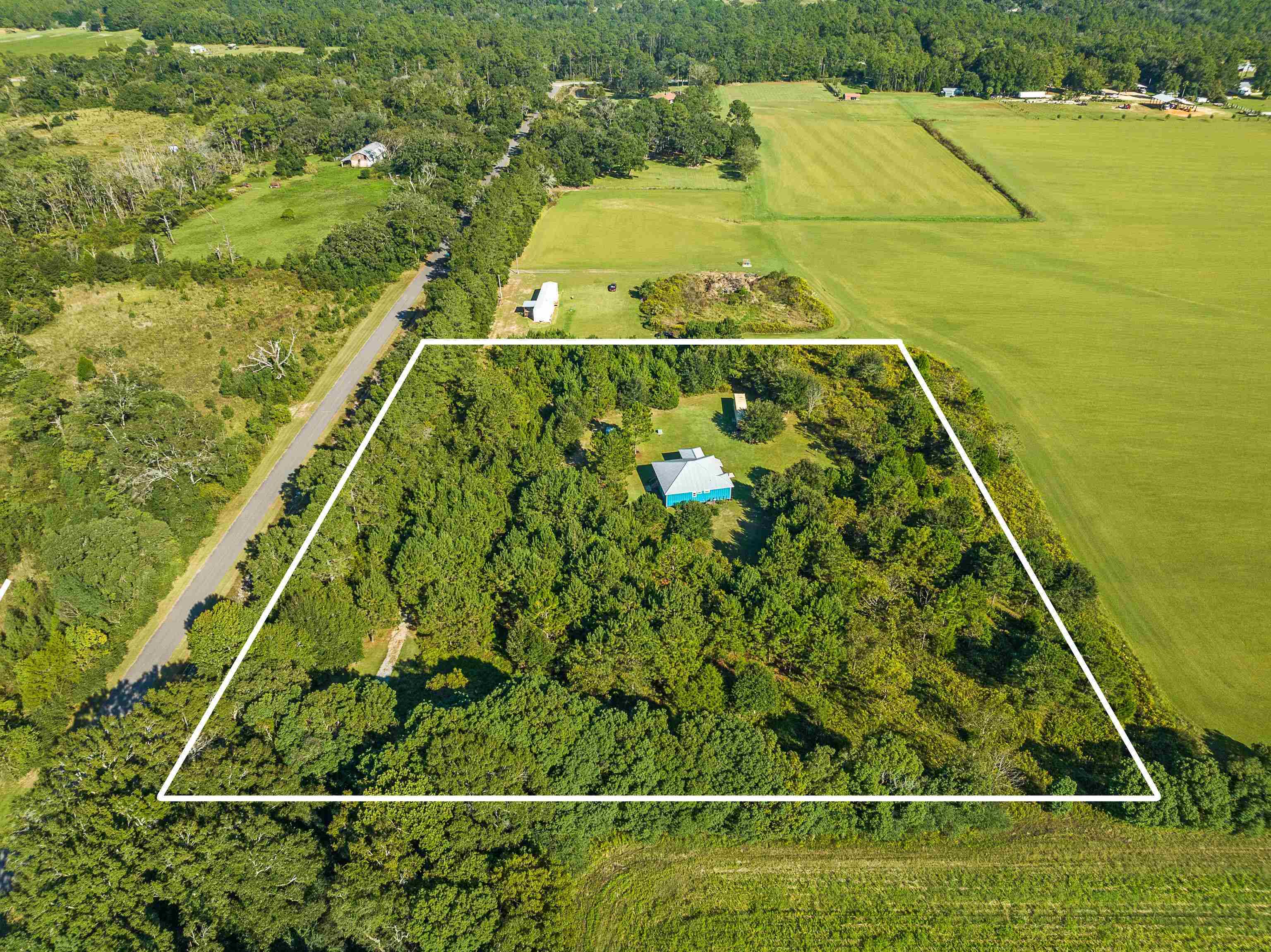 24616 Bretz Lane Elberta, AL 36530 - Photo 3 of 42 Drone perspective showing property in proximity to Bretz Lane and surrounding landscape.