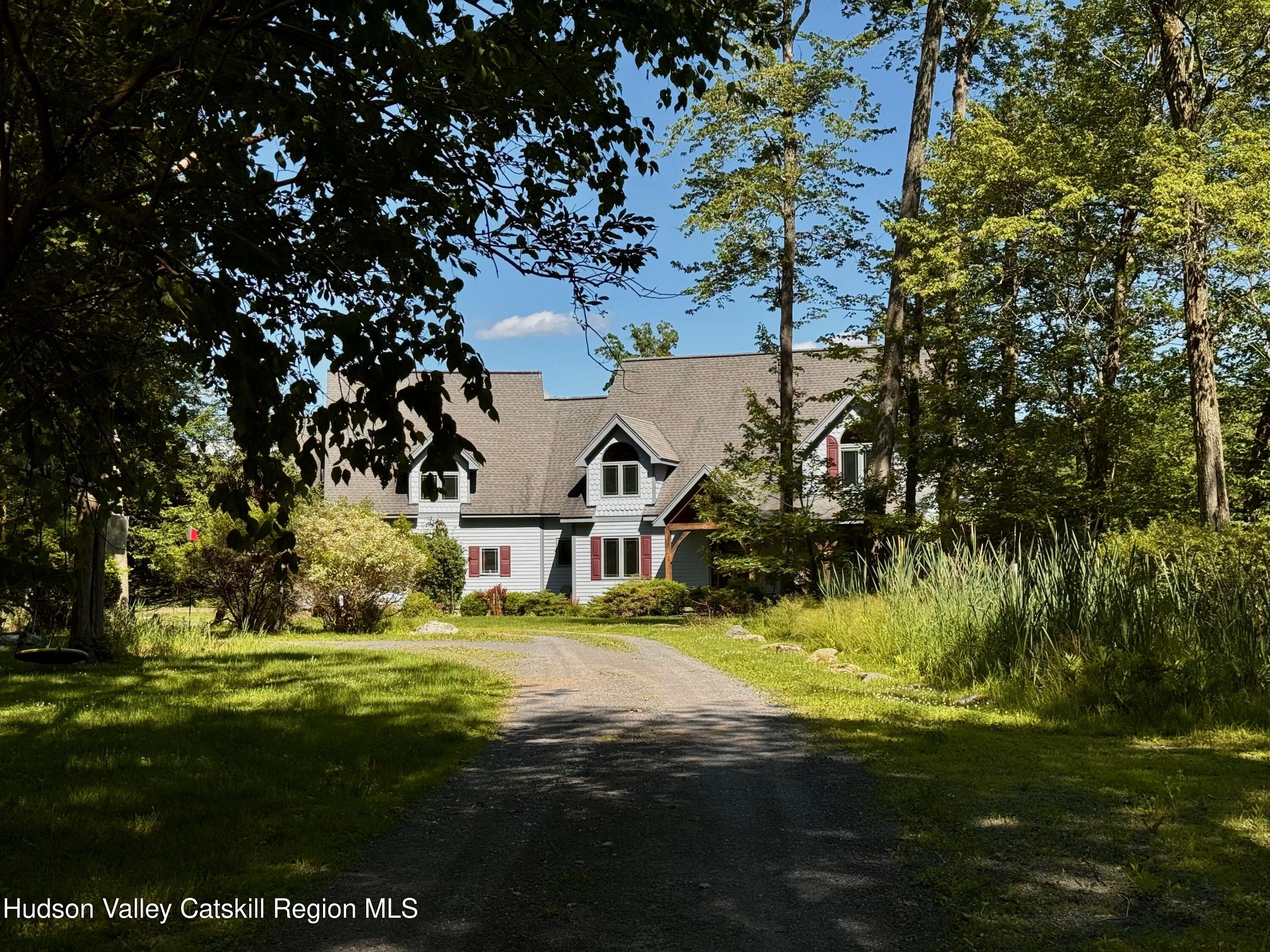 a view of a house with a big yard