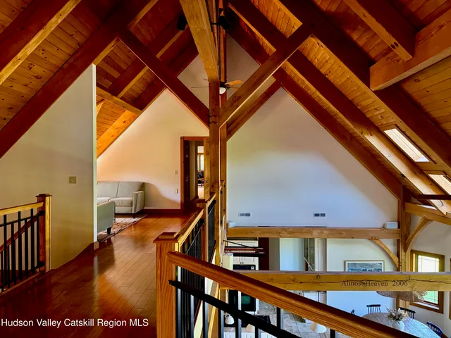 a view of living room with furniture and floor to ceiling window