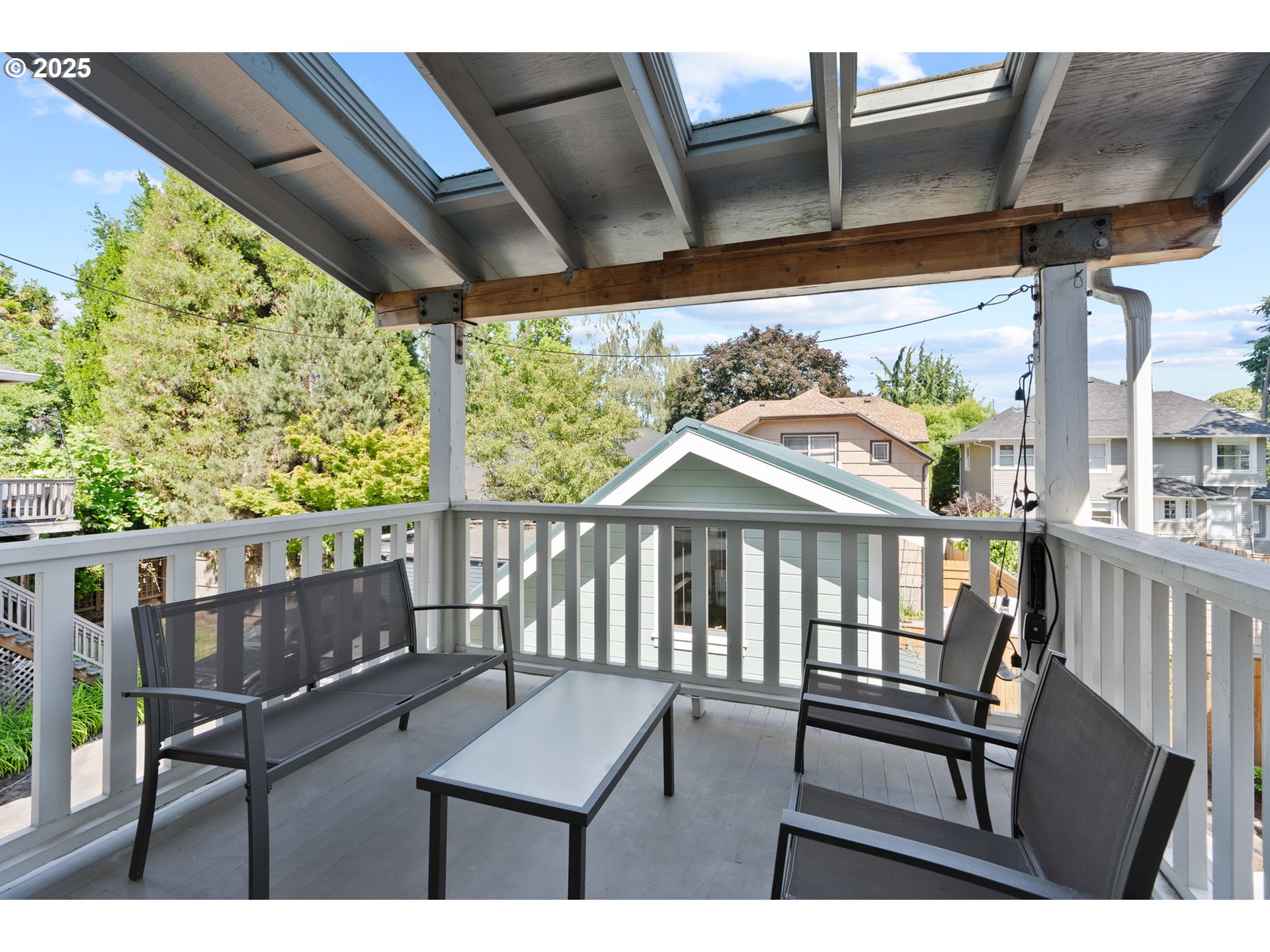 1912 Northeast 11th Avenue Portland, OR 97212 - Photo 14 of 41 a view of a chairs and table in the balcony