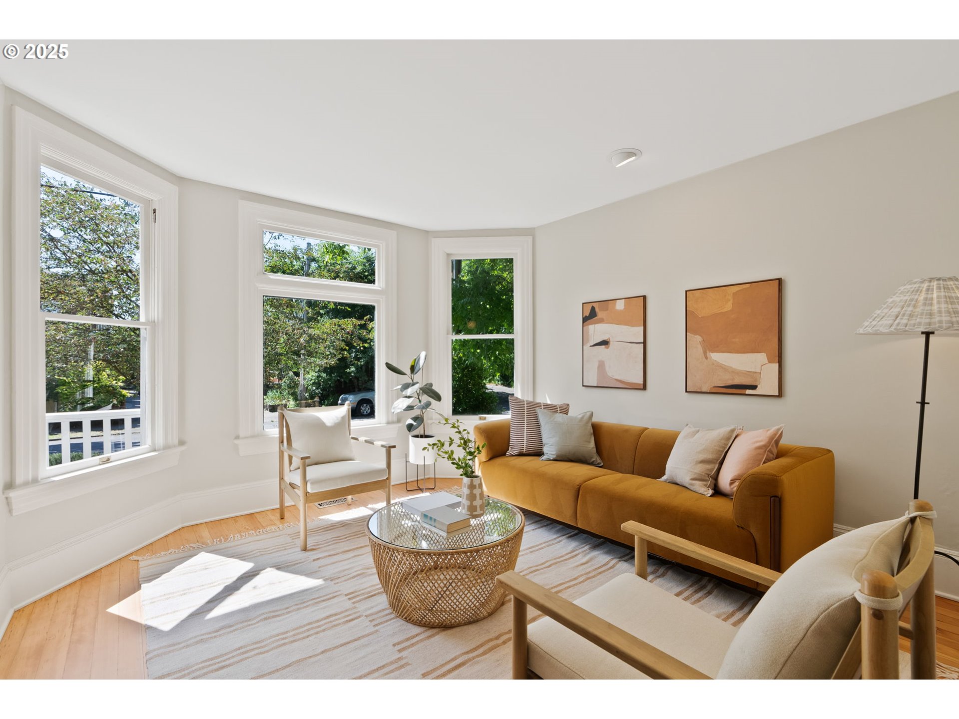 1912 Northeast 11th Avenue Portland, OR 97212 - Photo 2 of 41 a living room with furniture and a large window