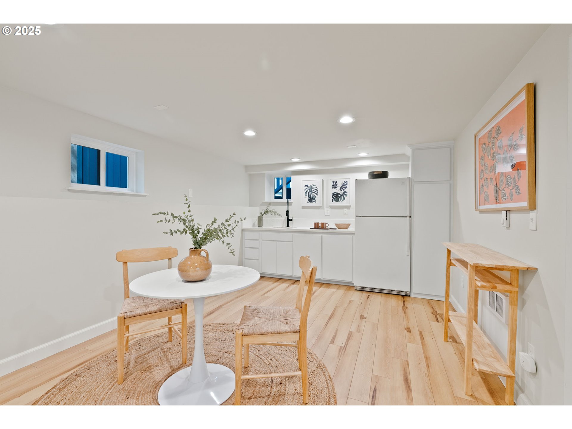 1912 Northeast 11th Avenue Portland, OR 97212 - Photo 22 of 41 a living room with furniture and wooden floor