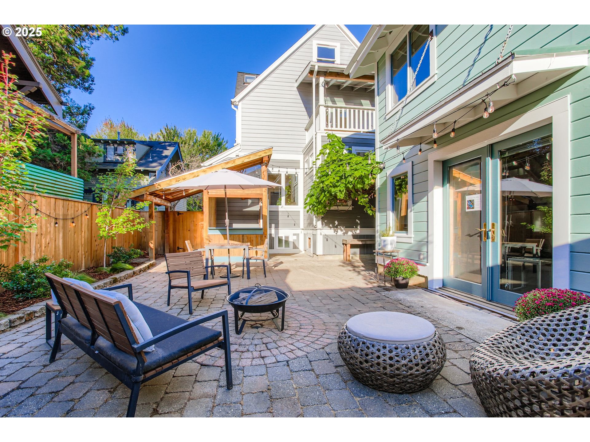 1912 Northeast 11th Avenue Portland, OR 97212 - Photo 36 of 41 a view of a patio with a table and chairs