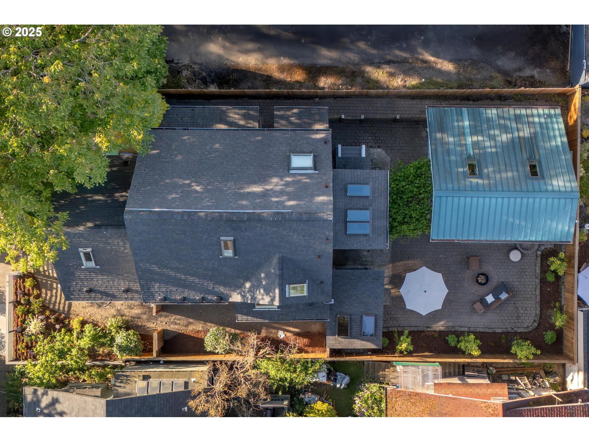 1912 Northeast 11th Avenue Portland, OR 97212 - Photo 39 of 41 an aerial view of a house with a yard and a garage