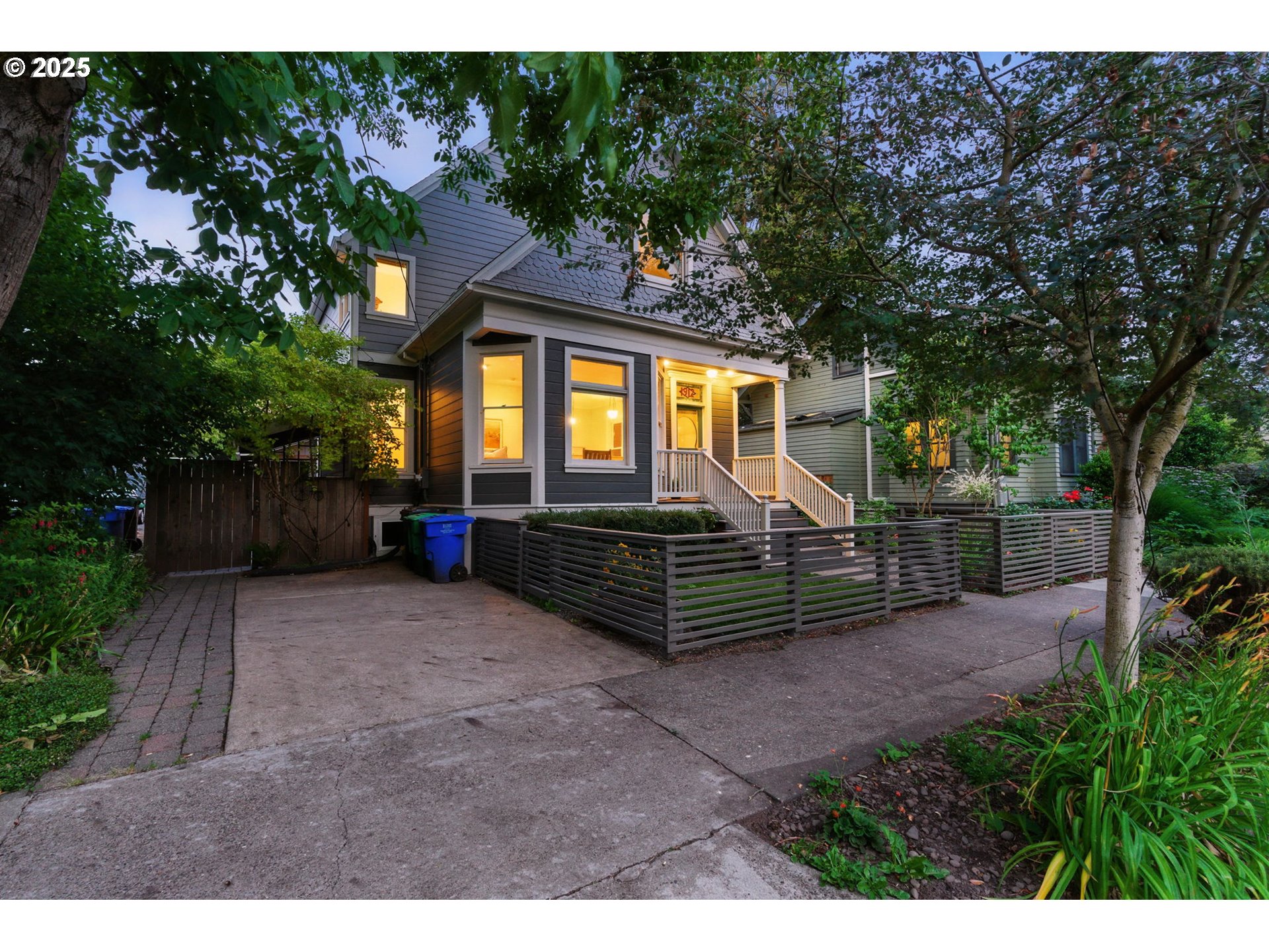 1912 Northeast 11th Avenue Portland, OR 97212 - Photo 40 of 41 a front view of a house with a garden