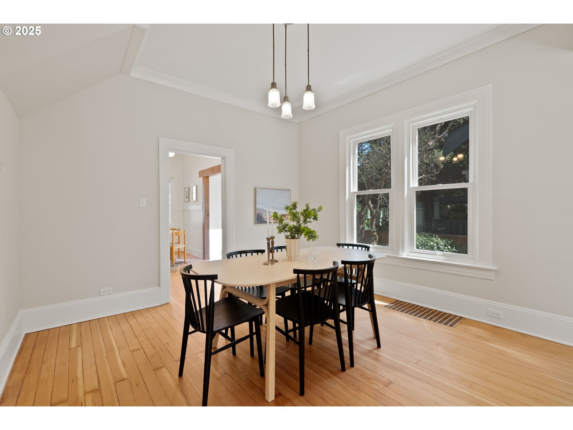 1912 Northeast 11th Avenue Portland, OR 97212 - Photo 4 of 41 a view of a dining room with furniture window and wooden floor
