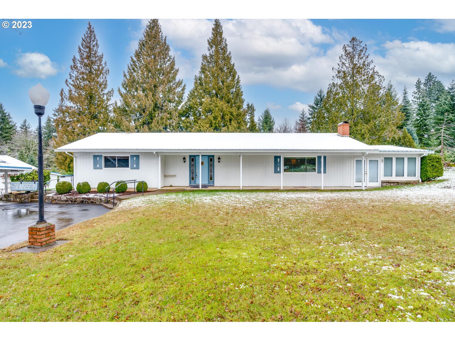 23728 South Springwater Road Estacada, OR 97023 - Photo 4 of 31 a view of a house with a swimming pool