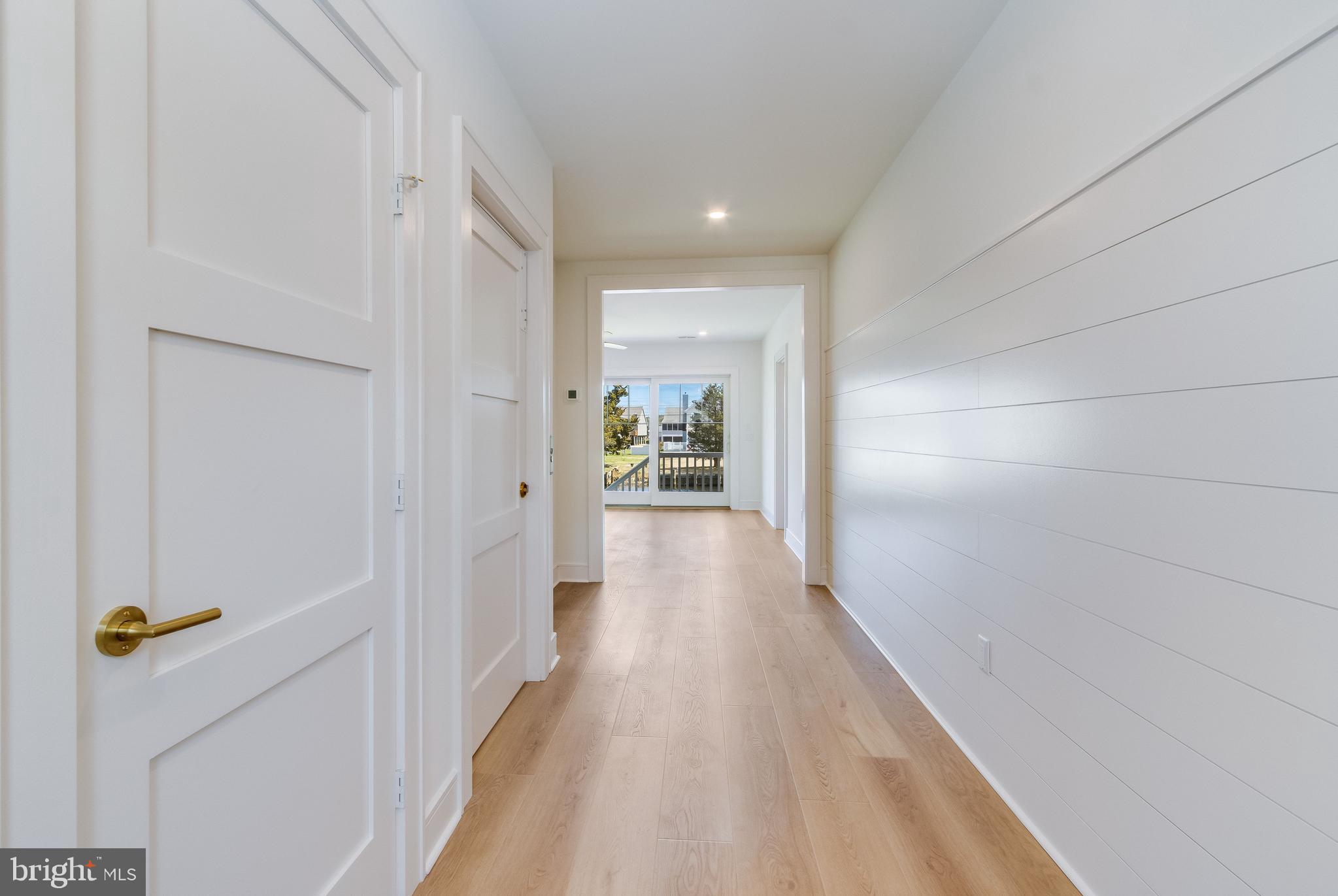 322 York Road South Bethany, DE 19930 - Photo 13 of 137 Light-Filled Entry Hallway with Shiplap Detail