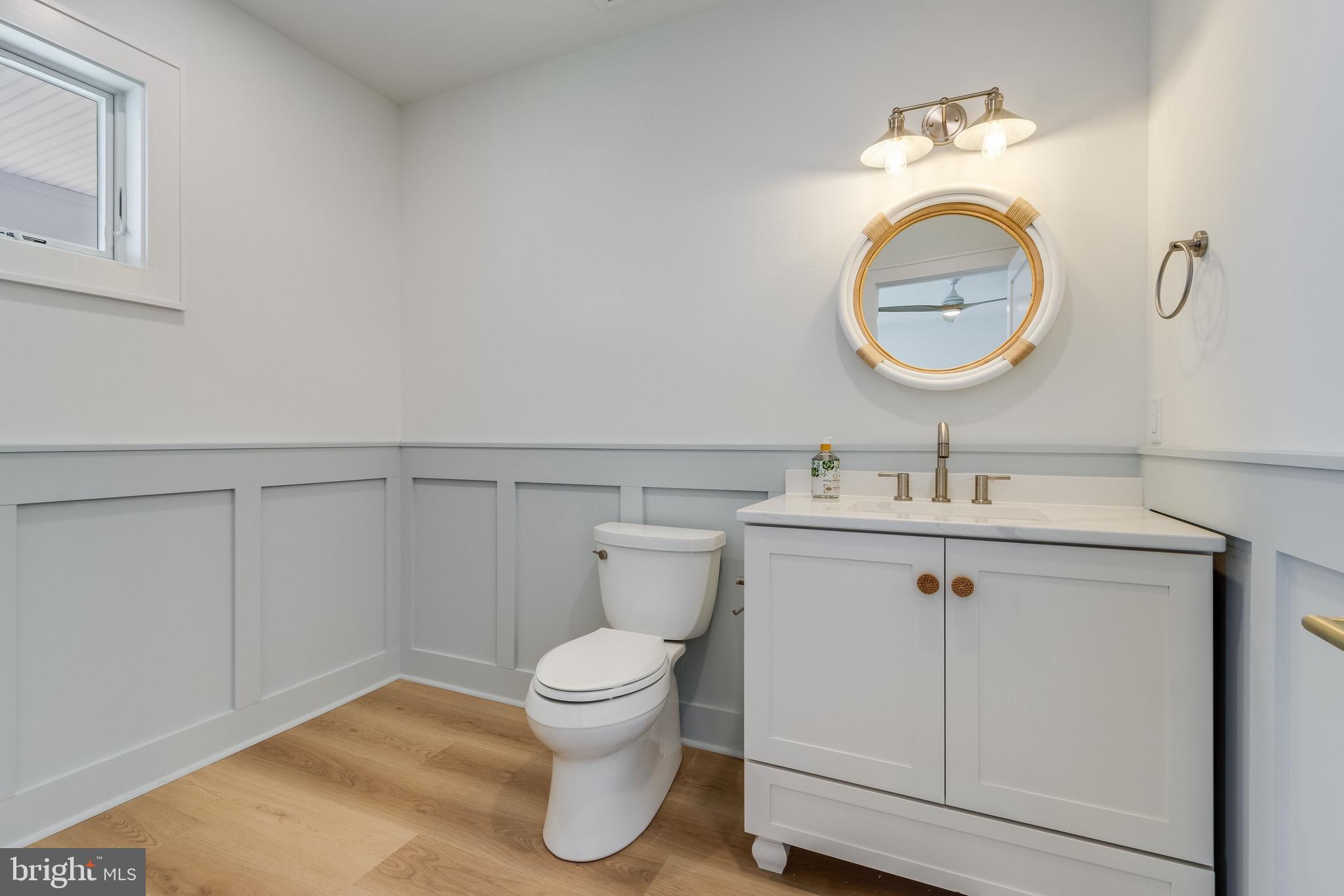 322 York Road South Bethany, DE 19930 - Photo 26 of 137 Designer Powder Room with Board & Batten