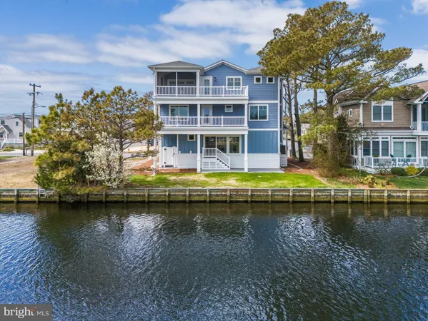 a view of a balcony with wooden floor