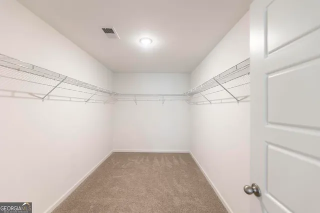 a view of a room with racks on the wall