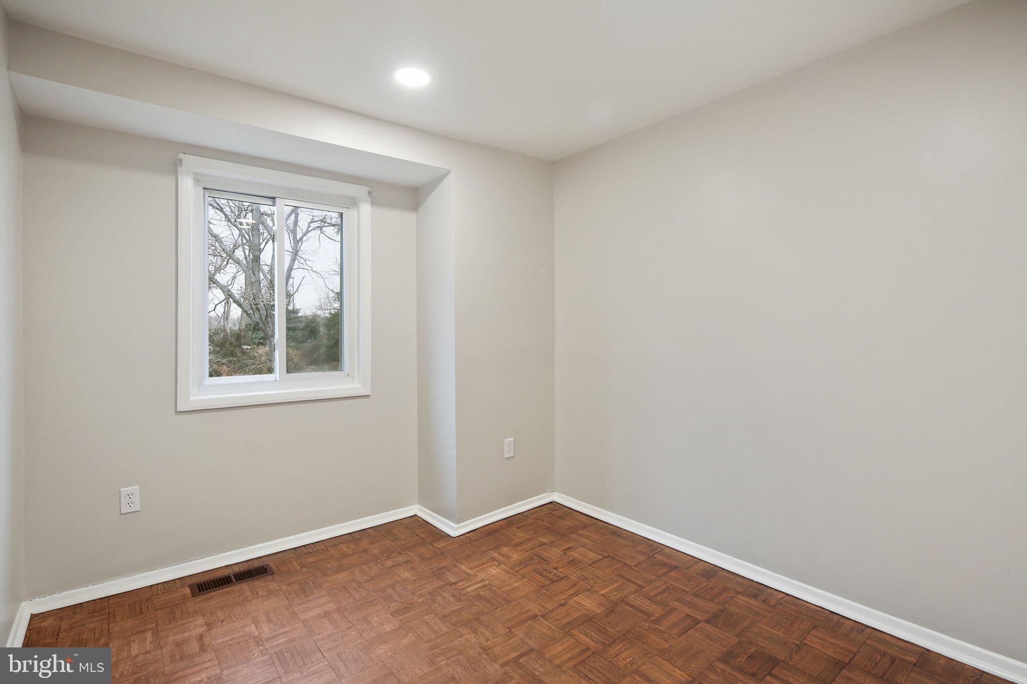 9432 Merryrest Road Columbia, MD 21045 - Photo 19 of 47 an empty room with a window