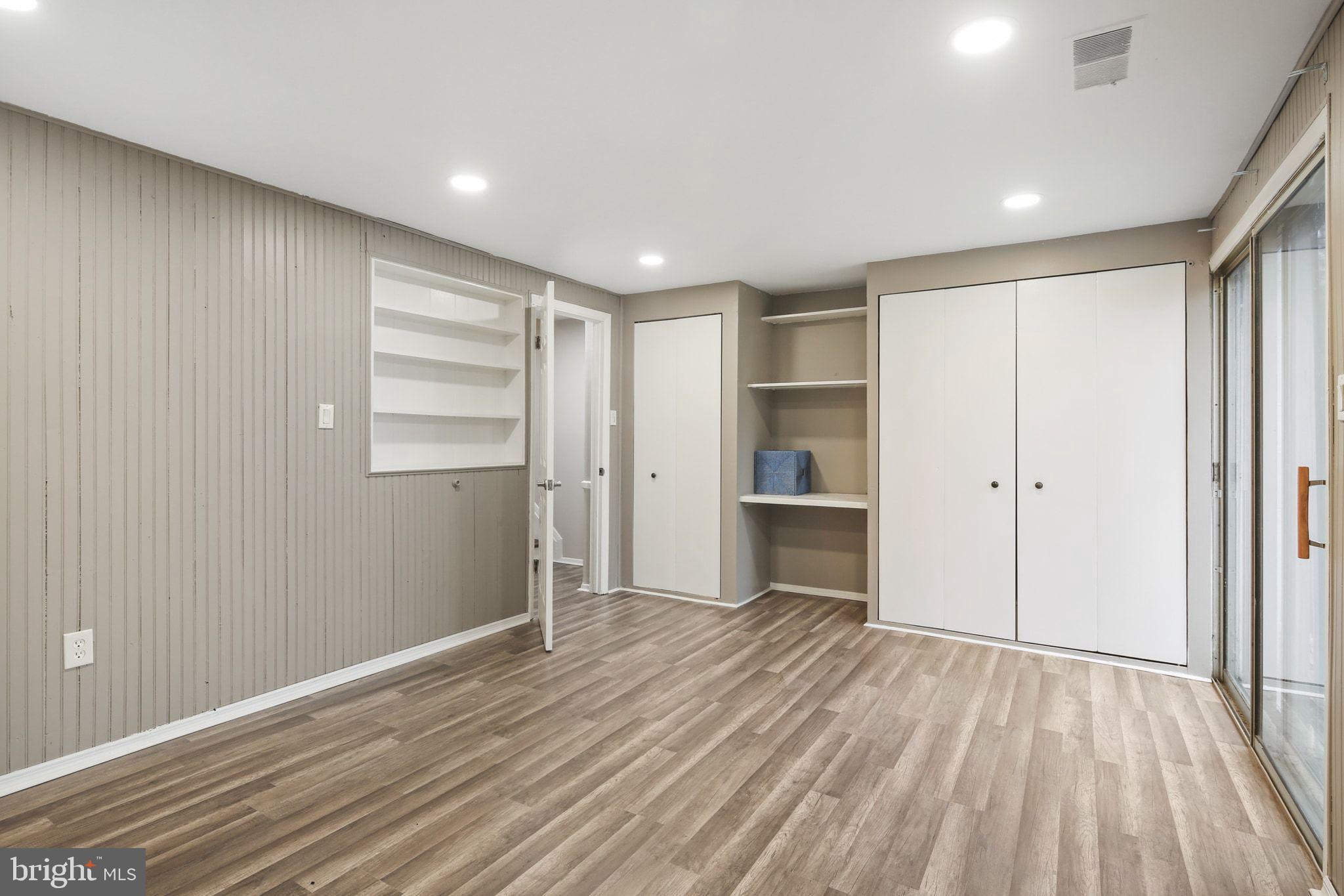 9432 Merryrest Road Columbia, MD 21045 - Photo 24 of 47 a view of empty room with wooden floor