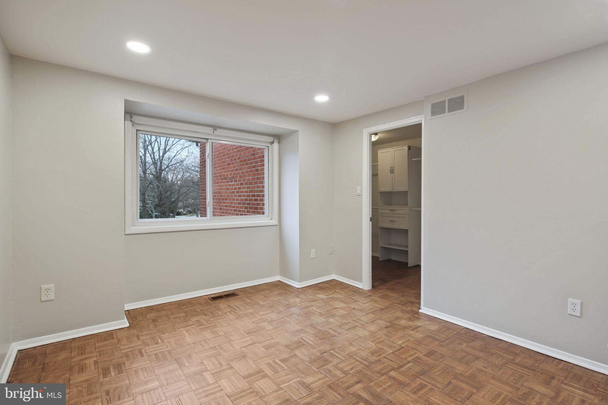 9432 Merryrest Road Columbia, MD 21045 - Photo 32 of 47 a view of an empty room with a window