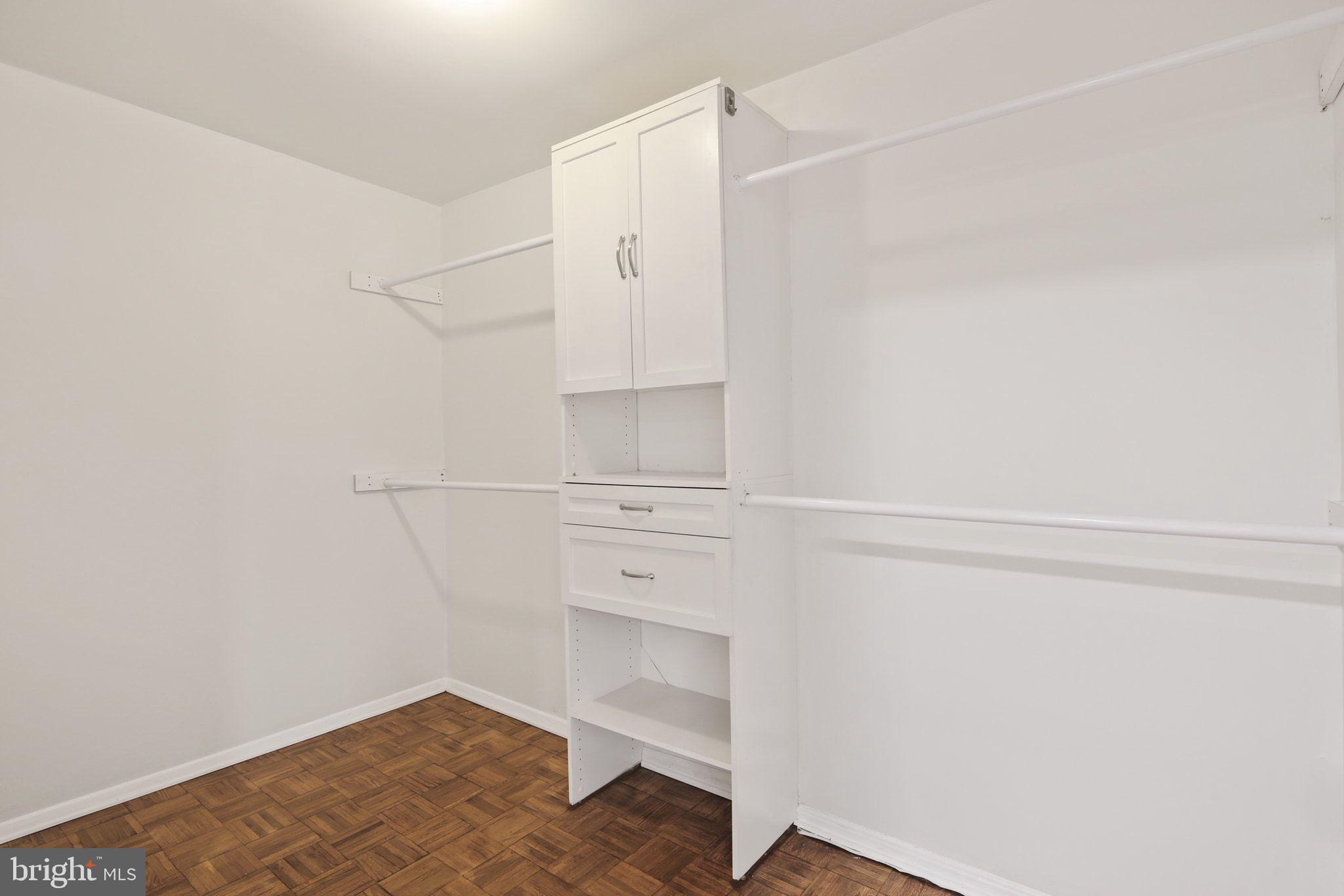 9432 Merryrest Road Columbia, MD 21045 - Photo 35 of 47 a view of walk in closet with empty racks