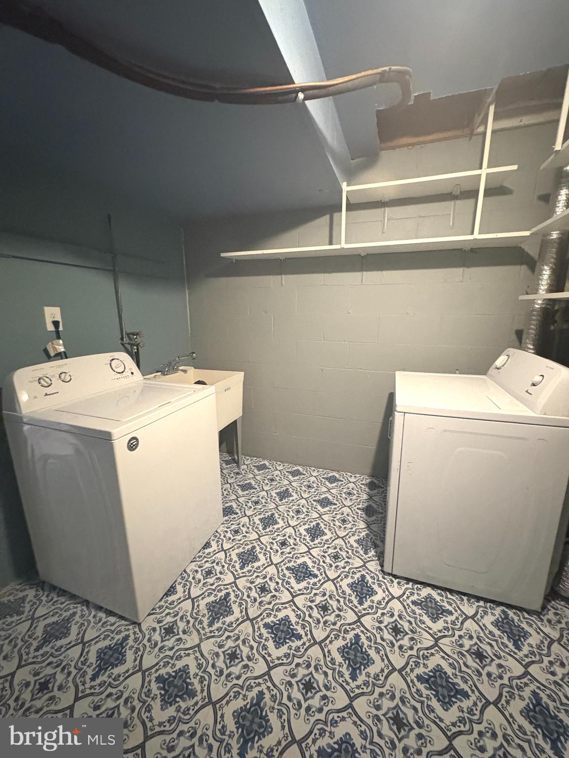 9432 Merryrest Road Columbia, MD 21045 - Photo 44 of 47 a utility room with dryer and washer