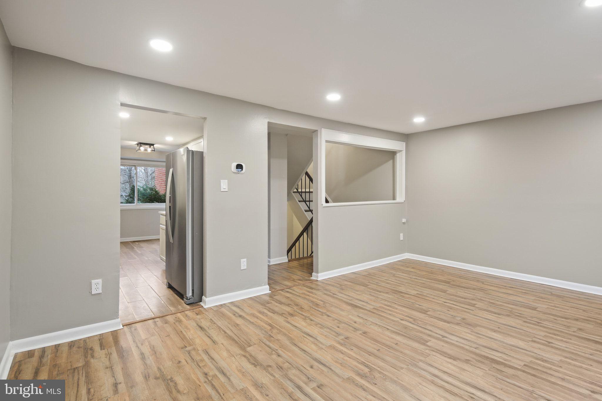 9432 Merryrest Road Columbia, MD 21045 - Photo 10 of 47 a view of empty room with wooden floor