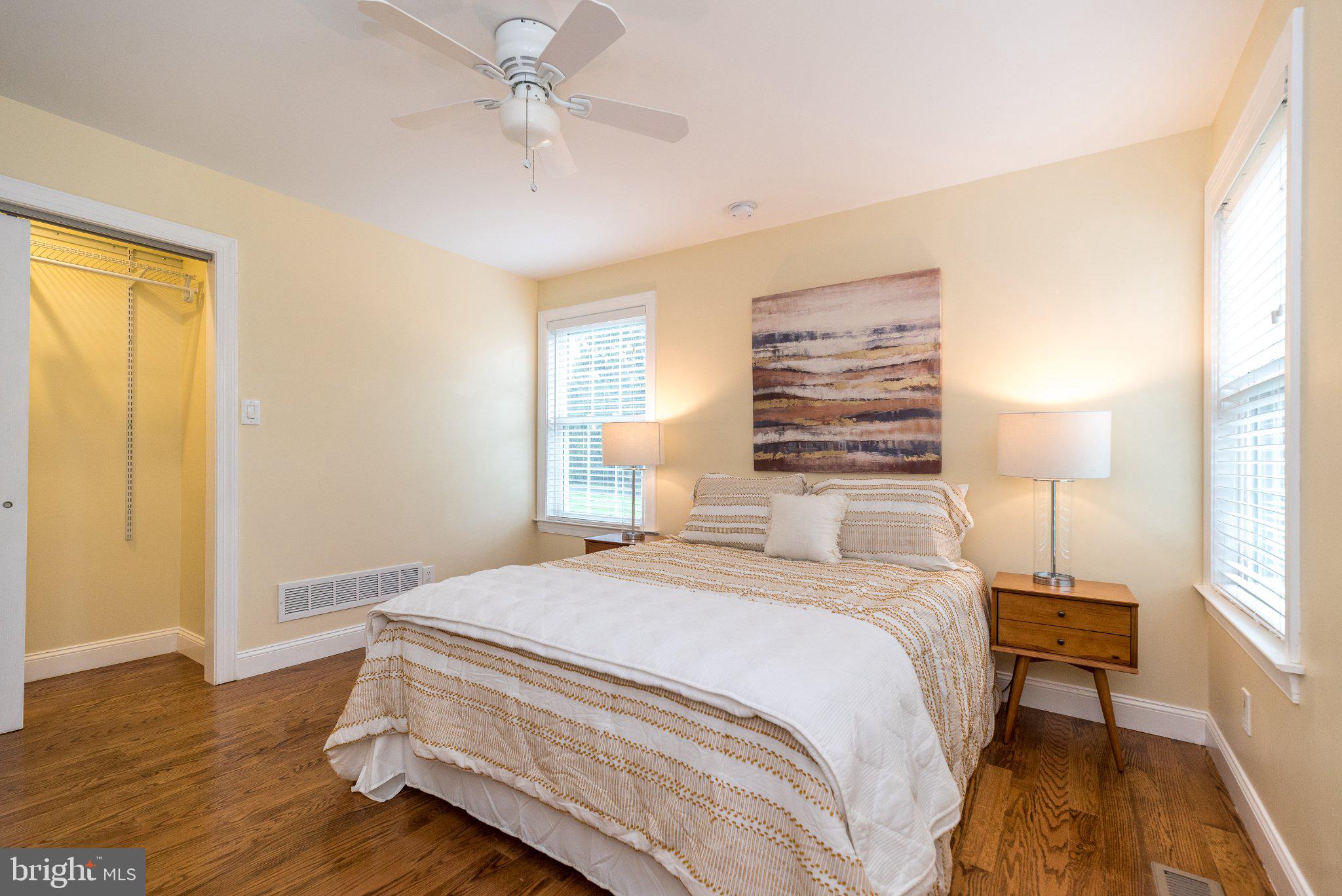 3645-57 Applebutter Road Fountainville, PA 18923 - Photo 27 of 98 a bedroom with a bed and wooden floor