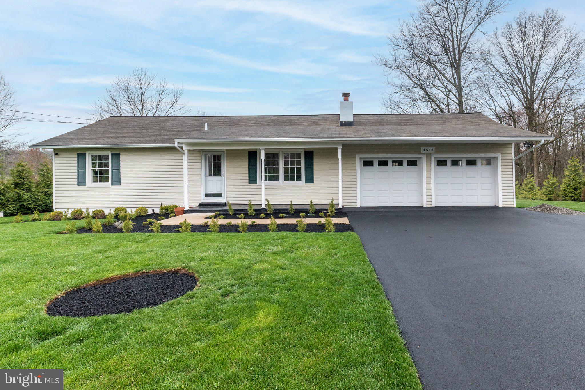 3645-57 Applebutter Road Fountainville, PA 18923 - Photo 49 of 98 a front view of house with yard and green space