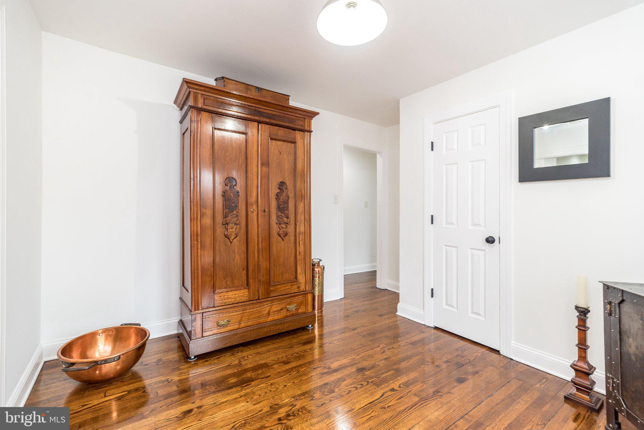 3645-57 Applebutter Road Fountainville, PA 18923 - Photo 65 of 98 a view of front door with wooden floor