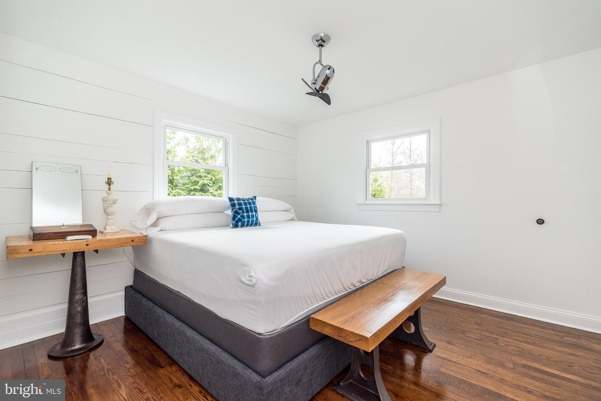 3645-57 Applebutter Road Fountainville, PA 18923 - Photo 68 of 98 a room with a bed and a table in it