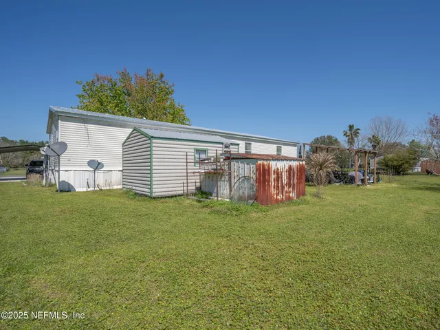 a house view with a garden space