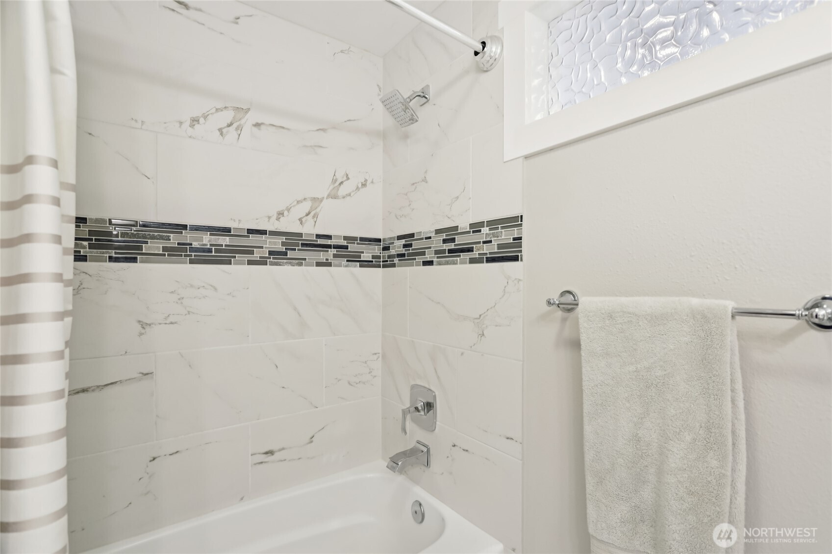 9512 235th Place Southwest Edmonds, WA 98020 - Photo 19 of 37 a bathroom with a shower and a bathtub