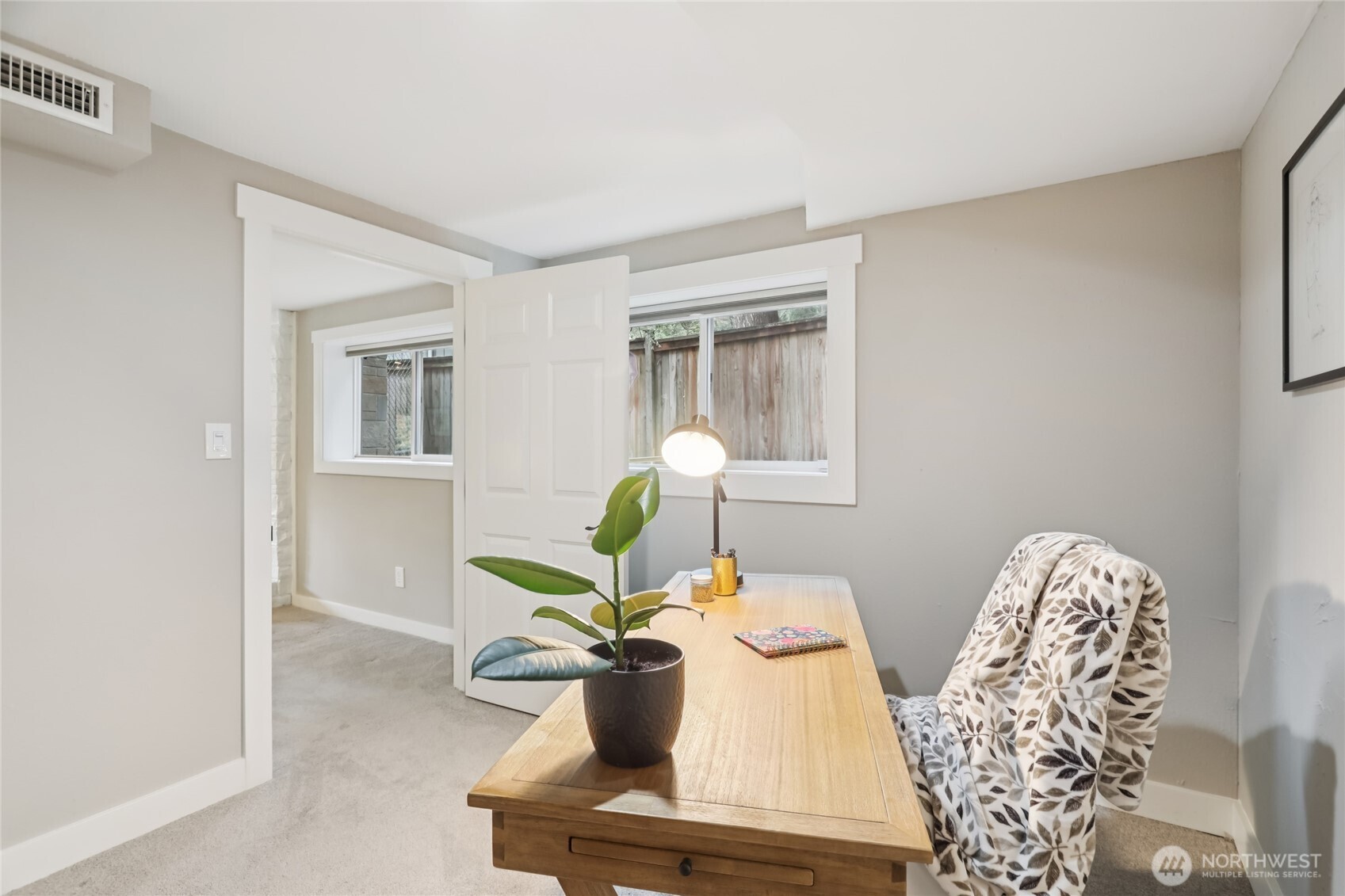9512 235th Place Southwest Edmonds, WA 98020 - Photo 21 of 37 a living room with furniture flowerpot and window