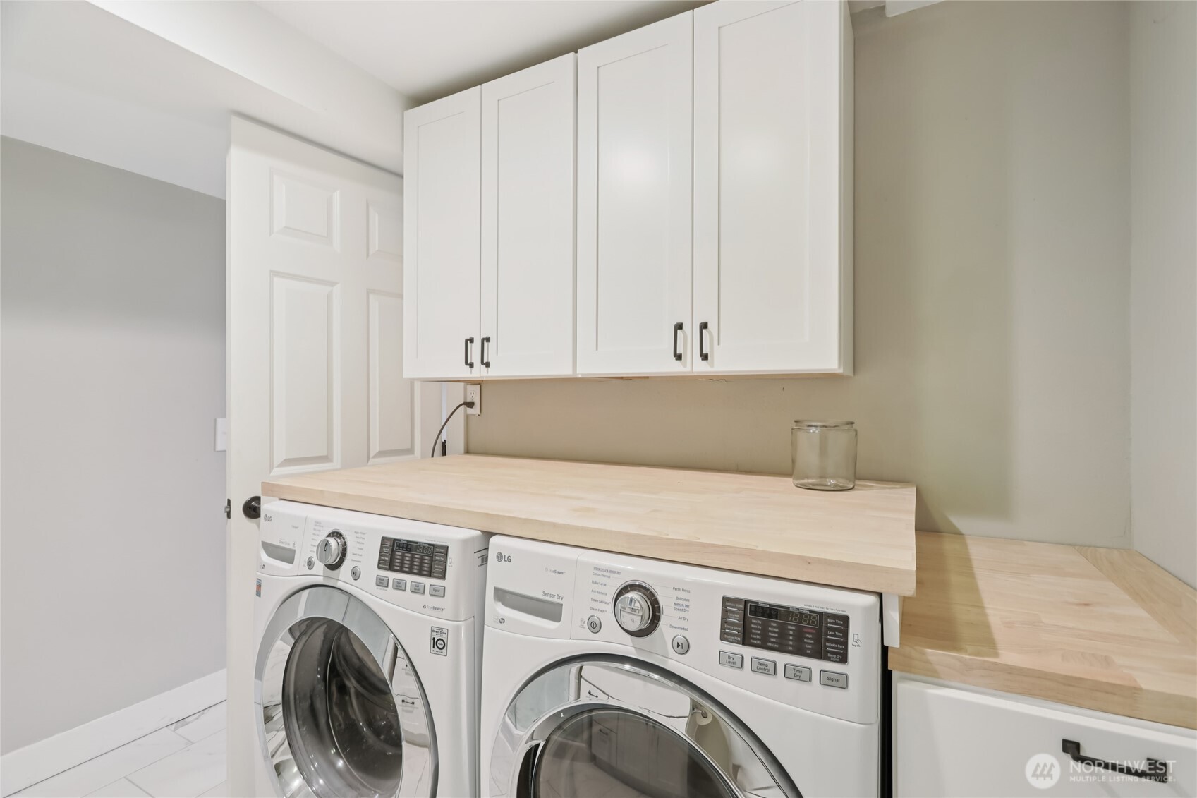 9512 235th Place Southwest Edmonds, WA 98020 - Photo 23 of 37 a utility room with dryer and washer