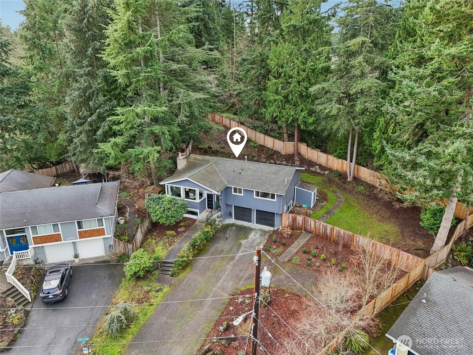 9512 235th Place Southwest Edmonds, WA 98020 - Photo 36 of 37 an aerial view of a house with a garden and plants