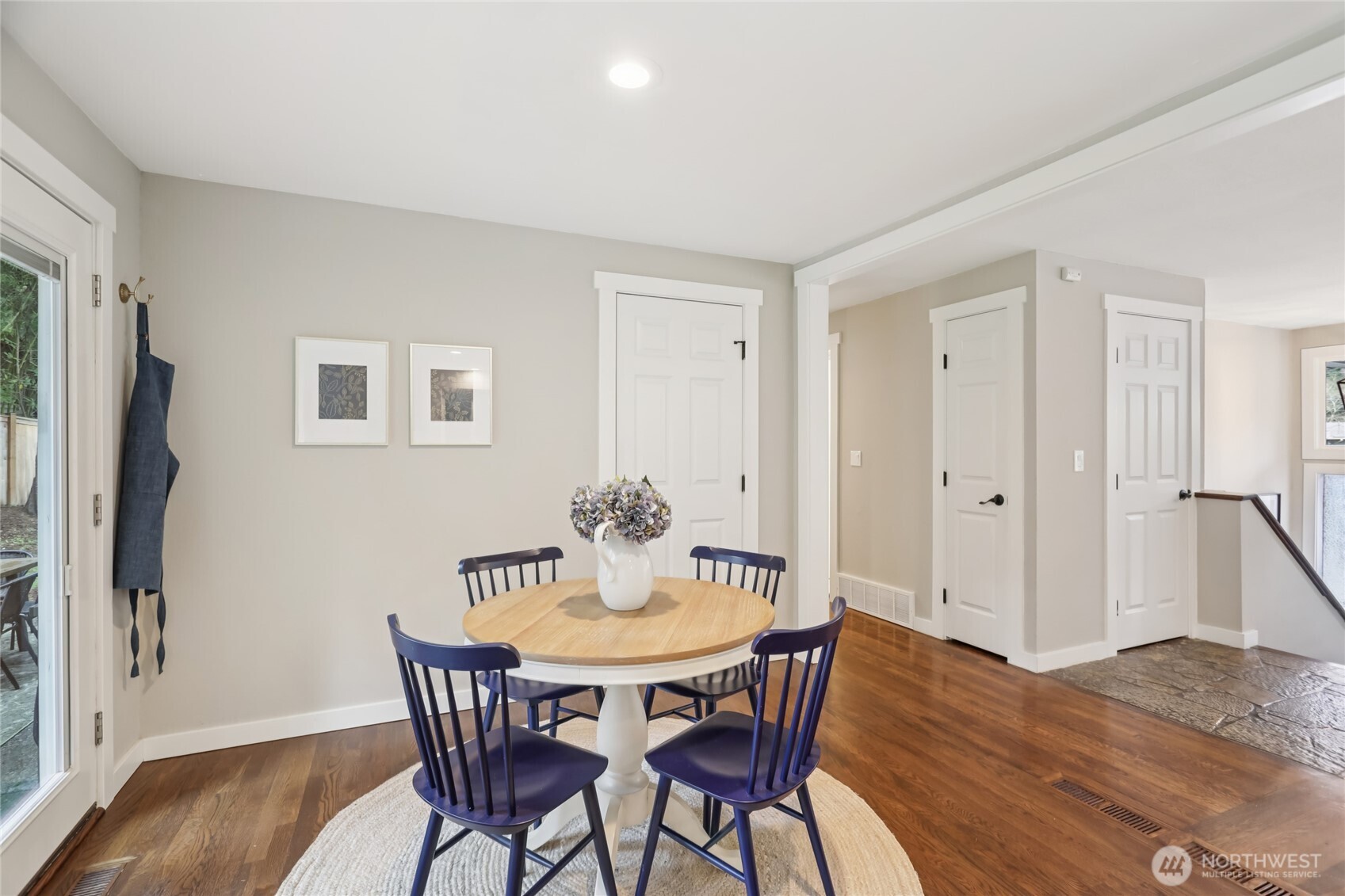 9512 235th Place Southwest Edmonds, WA 98020 - Photo 10 of 37 a view of a dining room with furniture and wooden floor