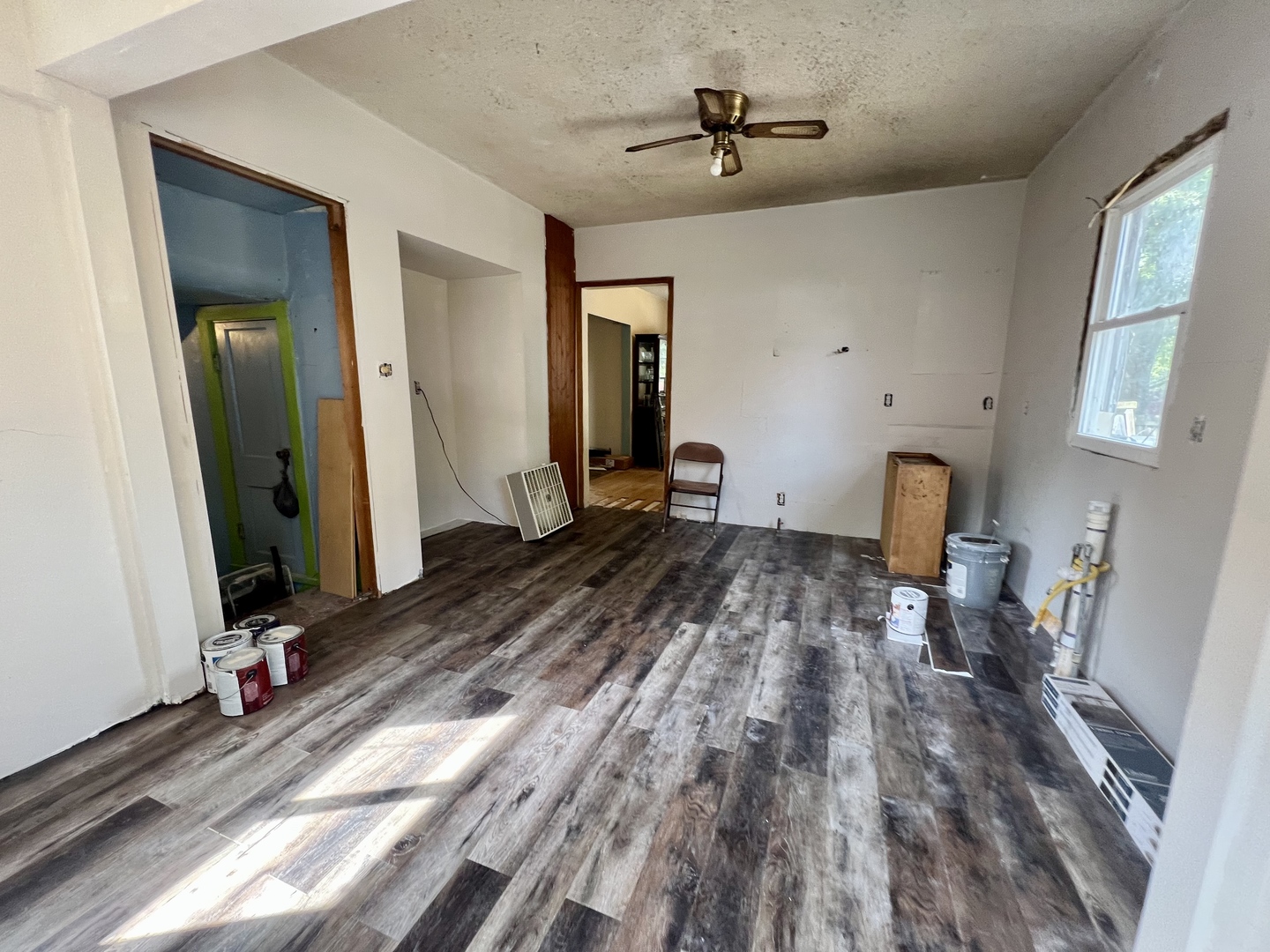 212 Vine Street Villa Grove, IL 61956 - Photo 13 of 36 a bedroom with a bed and a mirror on the dresser