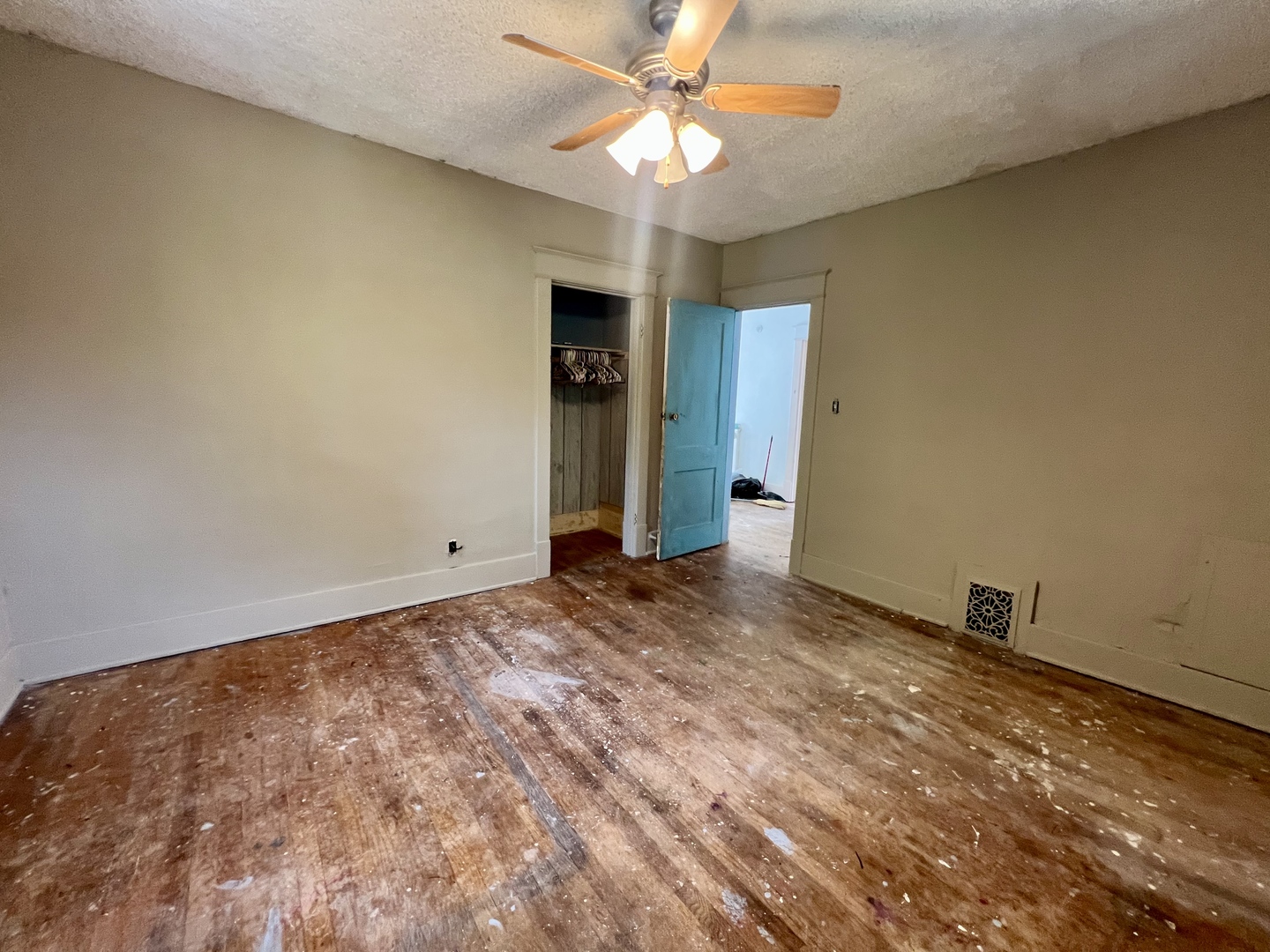 212 Vine Street Villa Grove, IL 61956 - Photo 22 of 36 a view of an empty room and chandelier fan