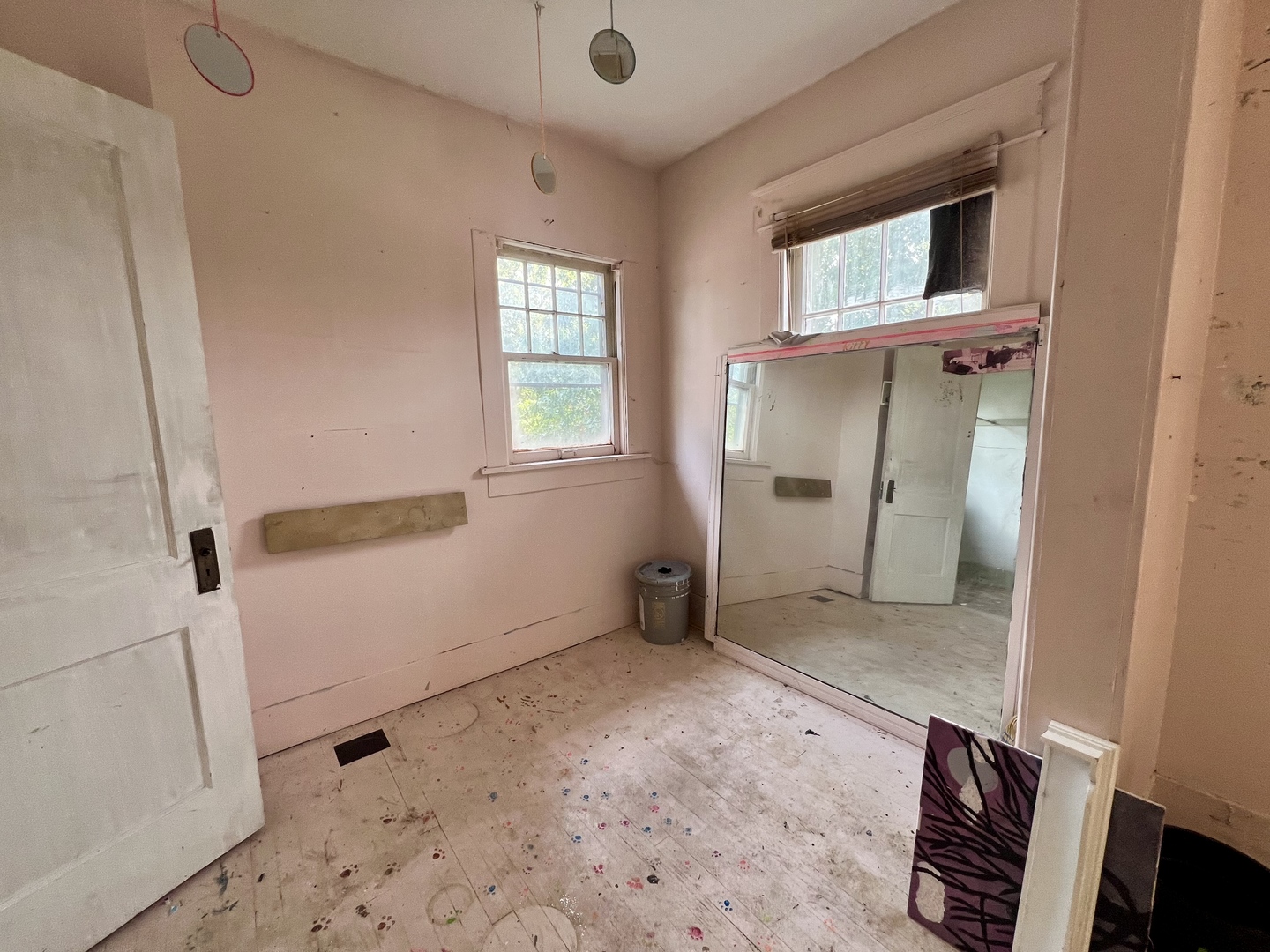 212 Vine Street Villa Grove, IL 61956 - Photo 31 of 36 a view of an empty room with a fireplace and a window