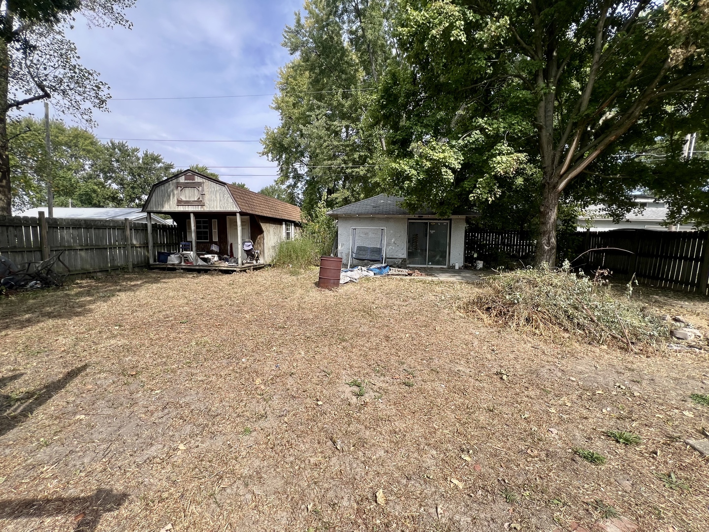 212 Vine Street Villa Grove, IL 61956 - Photo 34 of 36 a view of a house with a yard covered in snow