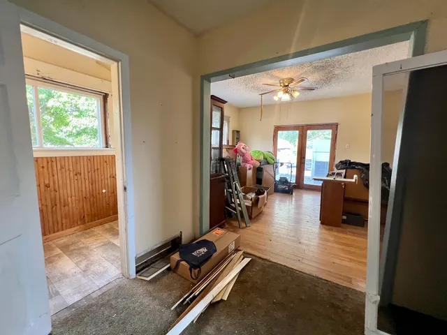 a bathroom with a toilet a sink and a window