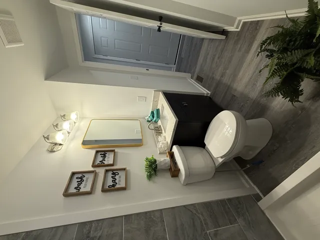 a view of livingroom with furniture and wooden floor