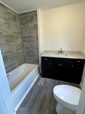 a bathroom with a sink and a vanity
