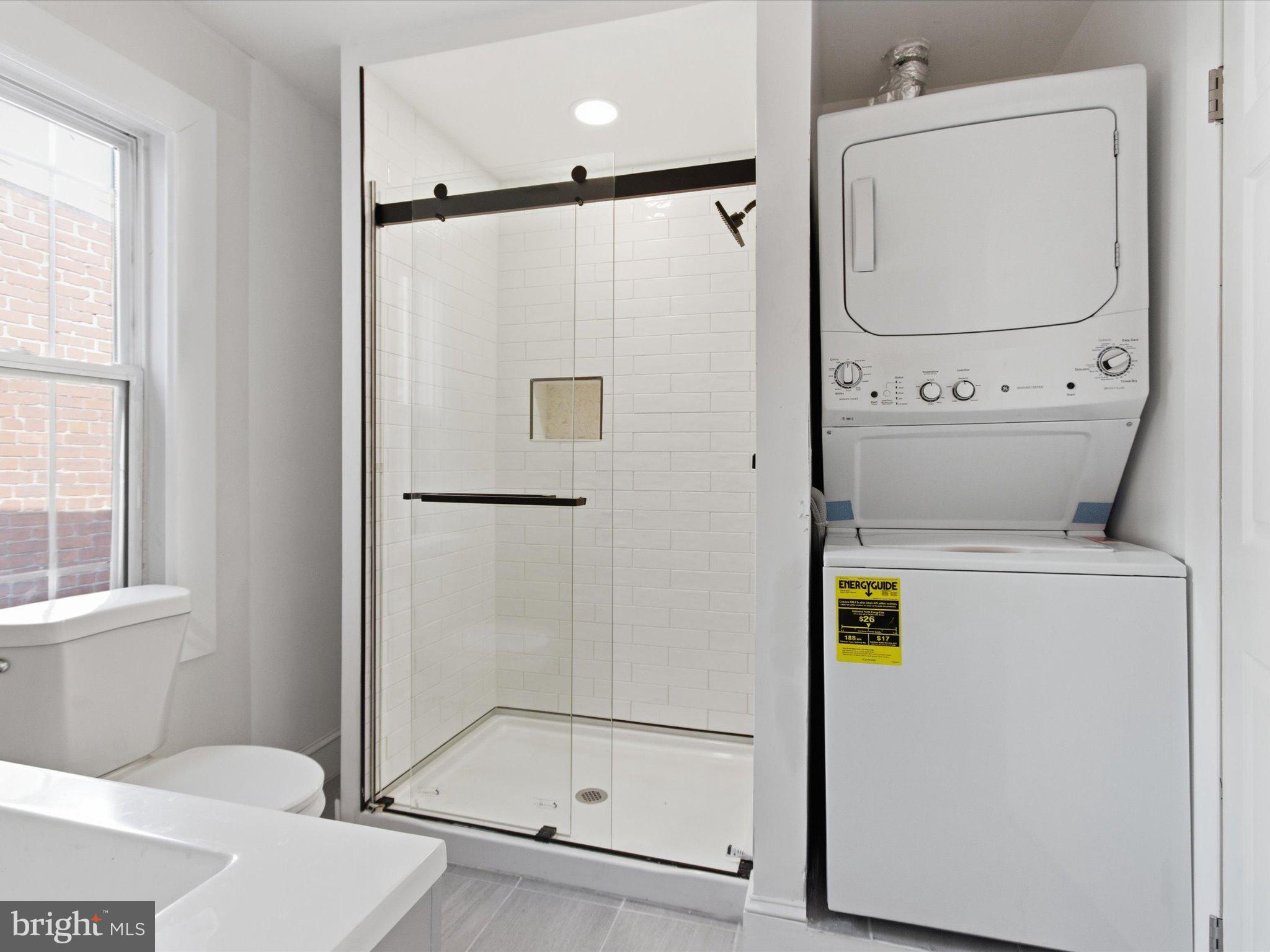 2617 13th Street Northwest, Unit PH Washington, DC 20009 - Photo 6 of 12 a bathroom with a shower and toilet